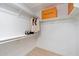 Walk-in closet featuring multiple shelving units at 14862 N 90Th Pl, Scottsdale, AZ 85260