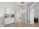 Bright hallway with built-in storage, and doorway view to bedroom, promoting airy appeal at 14862 N 90Th Pl, Scottsdale, AZ 85260