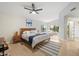 Bright main bedroom featuring ceiling fan, and multiple windows at 14862 N 90Th Pl, Scottsdale, AZ 85260