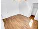 Minimal bedroom with wood-look vinyl flooring and a well-lit space at 14950 W Rockrose Way, Surprise, AZ 85374