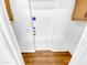 Neutral entryway with wood-look vinyl flooring and closet storage solutions at 14950 W Rockrose Way, Surprise, AZ 85374
