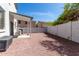 Spacious backyard with neutral ground cover and covered patio; perfect for entertaining at 15054 N 173Rd Dr, Surprise, AZ 85388