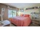 Inviting bedroom featuring a comfy bed, shutters on the windows, and tasteful decorations at 1562 E Gleneagle Dr, Chandler, AZ 85249
