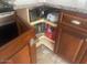 Corner cabinet featuring a rotating shelf to optimize storage at 1562 E Gleneagle Dr, Chandler, AZ 85249