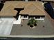 Charming home featuring a two-car garage, desert landscaping, and an inviting front entrance at 1562 E Gleneagle Dr, Chandler, AZ 85249