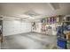 Clean and bright two-car garage with automatic door opener and extra storage space at 1562 E Gleneagle Dr, Chandler, AZ 85249