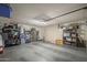 Spacious garage with ample storage, shelving, and room for parking and projects at 1562 E Gleneagle Dr, Chandler, AZ 85249