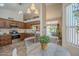 The kitchen features stainless steel appliances, granite counters, and an eat-in kitchen at 1562 E Gleneagle Dr, Chandler, AZ 85249