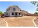 Spacious backyard featuring a covered patio and plenty of space for desert landscaping at 15808 N 164Th Ln, Surprise, AZ 85388