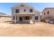 The home's backyard is spacious with a covered patio and clear view of the rear exterior elevation at 15808 N 164Th Ln, Surprise, AZ 85388
