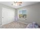 Bedroom showcasing a window with blinds, a closet, and soft lighting for a cozy and practical space at 15808 N 164Th Ln, Surprise, AZ 85388