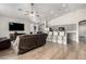 Inviting living room with a spacious layout, with access to kitchen and dining room at 17290 N 170Th Ln, Surprise, AZ 85374