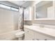 Bright bathroom with a tub and shower combination with updated vanity and fixtures at 20419 N 34Th St, Phoenix, AZ 85050