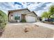 Charming single-story home with a two-car garage and low-maintenance desert landscaping at 20419 N 34Th St, Phoenix, AZ 85050