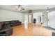 Spacious living room with neutral walls, wood flooring, and an open floor plan at 20419 N 34Th St, Phoenix, AZ 85050