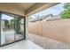 Covered patio featuring a sliding glass door to a well maintained backyard space at 20419 N 34Th St, Phoenix, AZ 85050