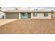 Charming single story home featuring a two car garage and xeriscape front yard at 2110 E Kathleen Rd, Phoenix, AZ 85022
