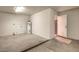 Garage with water heater and washer/dryer hookups at 2110 E Kathleen Rd, Phoenix, AZ 85022