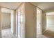 Hallway featuring carpeted floors, neutral paint, and bright white doors at 2110 E Kathleen Rd, Phoenix, AZ 85022