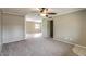 Inviting living room featuring neutral paint, carpeted floors, and bright, natural light at 2110 E Kathleen Rd, Phoenix, AZ 85022