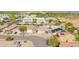 A high-angle shot of a Gathering-friendly neighborhood, featuring pools and desert-style landscaping at 21605 N 48Th Pl, Phoenix, AZ 85054
