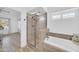 Bathroom featuring a shower and bathtub at 21605 N 48Th Pl, Phoenix, AZ 85054