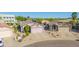 Charming single-Gathering home with desert landscaping, a two-car garage, and mountain views at 21605 N 48Th Pl, Phoenix, AZ 85054