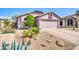 Charming single-Gathering home with a well-maintained front yard and a two-car garage at 21605 N 48Th Pl, Phoenix, AZ 85054