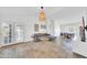 Open floor plan with a living room with stone tile floors at 21605 N 48Th Pl, Phoenix, AZ 85054
