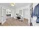 Bright home office with desk, chair, and closet space at 21605 N 48Th Pl, Phoenix, AZ 85054