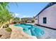 Beautiful pool with lush landscaping and patio, perfect for entertaining at 21605 N 48Th Pl, Phoenix, AZ 85054