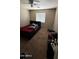 Bedroom featuring neutral walls, a ceiling fan, carpet flooring, and a comfortable sleeping area at 2324 W Darrel Rd, Phoenix, AZ 85041