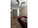Bedroom with neutral walls, carpet, ceiling fan, and a closet, perfect for relaxation at 2324 W Darrel Rd, Phoenix, AZ 85041