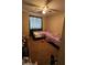 View of cozy bedroom with two beds, ceiling fan and good natural light at 2324 W Darrel Rd, Phoenix, AZ 85041