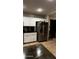 This kitchen features white cabinets and stainless steel appliances at 2324 W Darrel Rd, Phoenix, AZ 85041