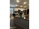 Bright kitchen features stainless steel appliances and a sizable island perfect for entertaining at 2324 W Darrel Rd, Phoenix, AZ 85041