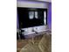 The living room has an oversized television at 2324 W Darrel Rd, Phoenix, AZ 85041