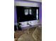 The living room has an oversized television at 2324 W Darrel Rd, Phoenix, AZ 85041