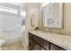 Bathroom showcasing a granite countertop vanity and a clean, white tub-shower combo at 24816 S Golfview Dr # 46, Sun Lakes, AZ 85248