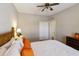 Bedroom featuring a cozy bed with bright pillows and a sliding door closet at 24816 S Golfview Dr # 46, Sun Lakes, AZ 85248