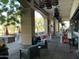 Inviting outdoor patio with comfortable seating and heaters, perfect for dining and relaxation at 24816 S Golfview Dr # 46, Sun Lakes, AZ 85248
