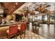 Stylish restaurant interior with modern lighting, comfortable seating, and large windows overlooking the landscape at 24816 S Golfview Dr # 46, Sun Lakes, AZ 85248