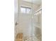 Close-up of a luxurious shower with pebble flooring, tile surround and a built-in bench at 24816 S Golfview Dr # 46, Sun Lakes, AZ 85248