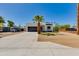 Modern home exterior with a well maintained yard, and a wide driveway at 2927 E Osborn Rd, Phoenix, AZ 85016