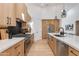 Stylish kitchen featuring custom cabinetry, stainless steel appliances, and modern design elements at 2927 E Osborn Rd, Phoenix, AZ 85016