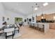 Open-concept living space featuring a modern kitchen, dining area, and spacious living room at 2927 E Osborn Rd, Phoenix, AZ 85016