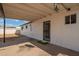 A covered back patio includes a security door and views of the backyard at 3044 W Dahlia Dr, Phoenix, AZ 85029