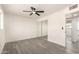 Bedroom features a full mirror sliding door closet and light grey toned wood flooring at 3044 W Dahlia Dr, Phoenix, AZ 85029