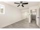 Bedroom features a full mirror sliding door closet and light grey toned wood flooring at 3044 W Dahlia Dr, Phoenix, AZ 85029