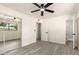 Bedroom features a full mirror sliding door closet and light grey toned wood flooring at 3044 W Dahlia Dr, Phoenix, AZ 85029